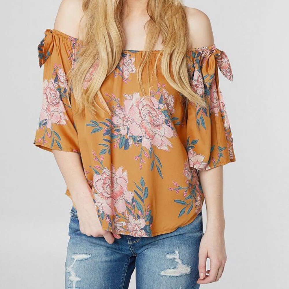 Cute top! New. Never been worn. Perfect condition.
